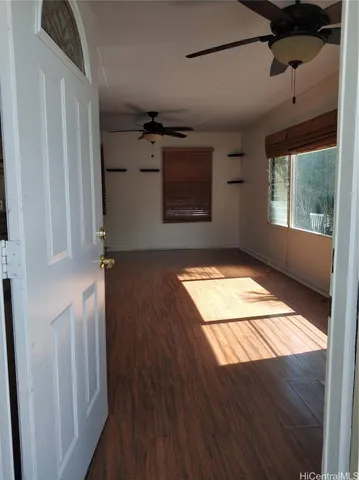 a kitchen with stainless steel appliances granite countertop a refrigerator a sink and a stove