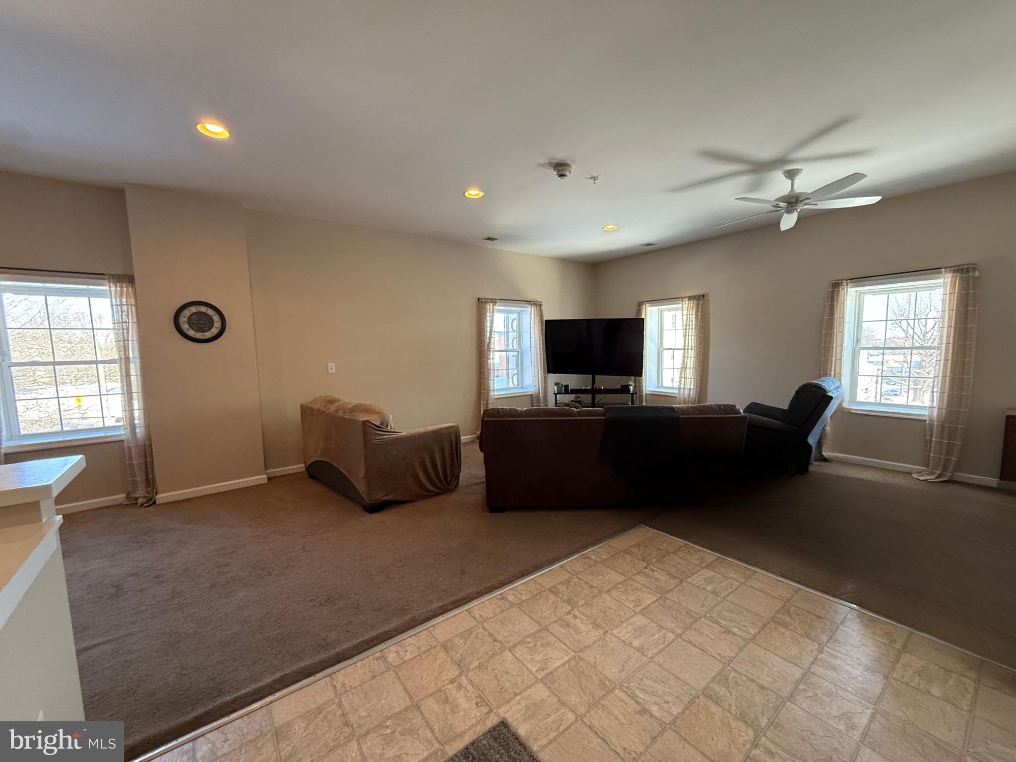 2 South 3rd Street, Unit 1 Oxford, PA 19363 - Photo 5 of 14 a living room with furniture and a flat screen tv