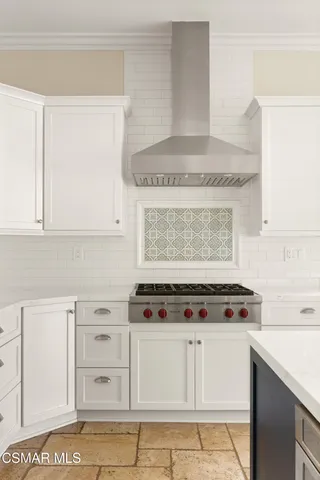 a bathroom with a shower sink vanity mirror and toilet