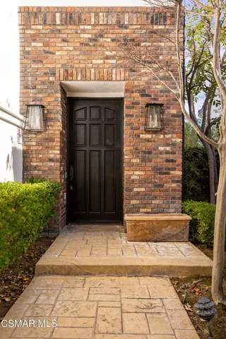 a view of a windows and a fireplace in a room
