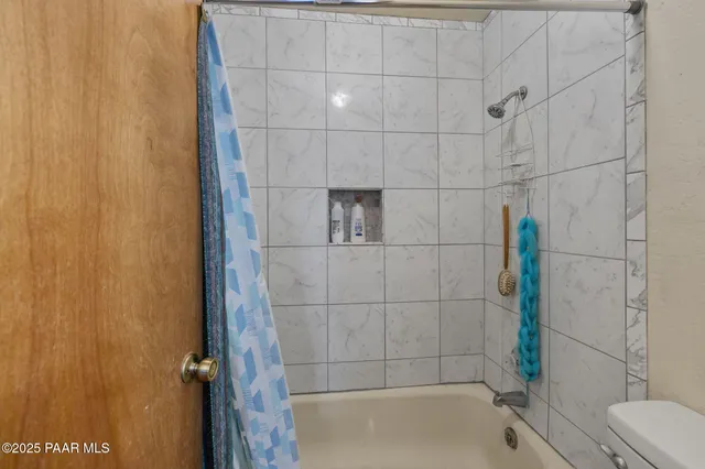 a view of a livingroom with a large window