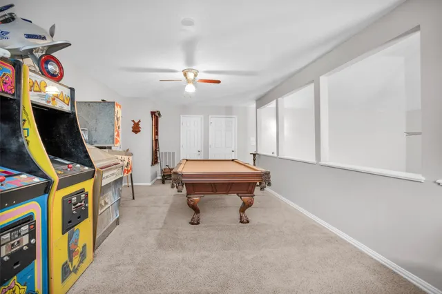 a room with furniture and a flat screen tv