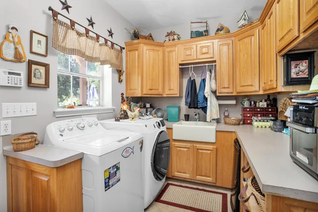 a utility room with dryer and washer