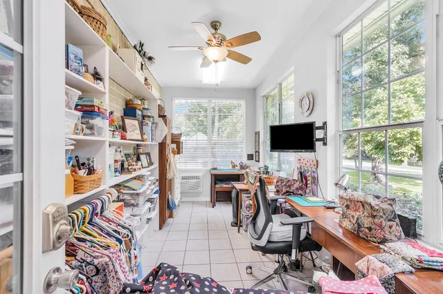 a living room with lots of furniture and a flat screen tv