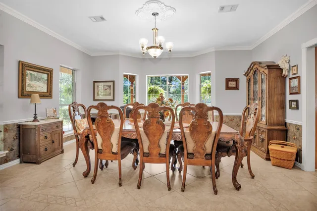 a view of a dining room with furniture