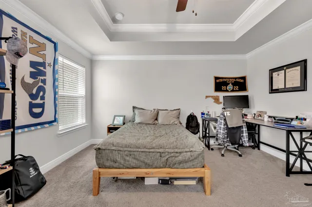 a bedroom with bed and a window