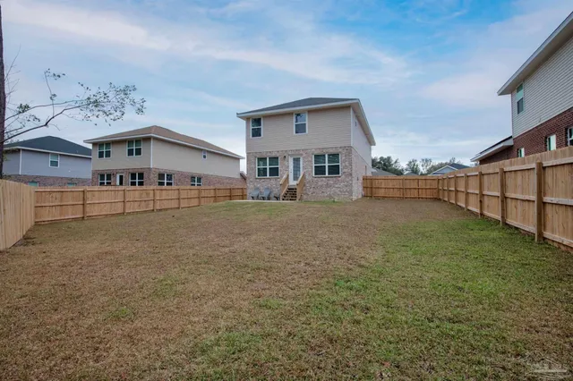 a big room with table and chairs