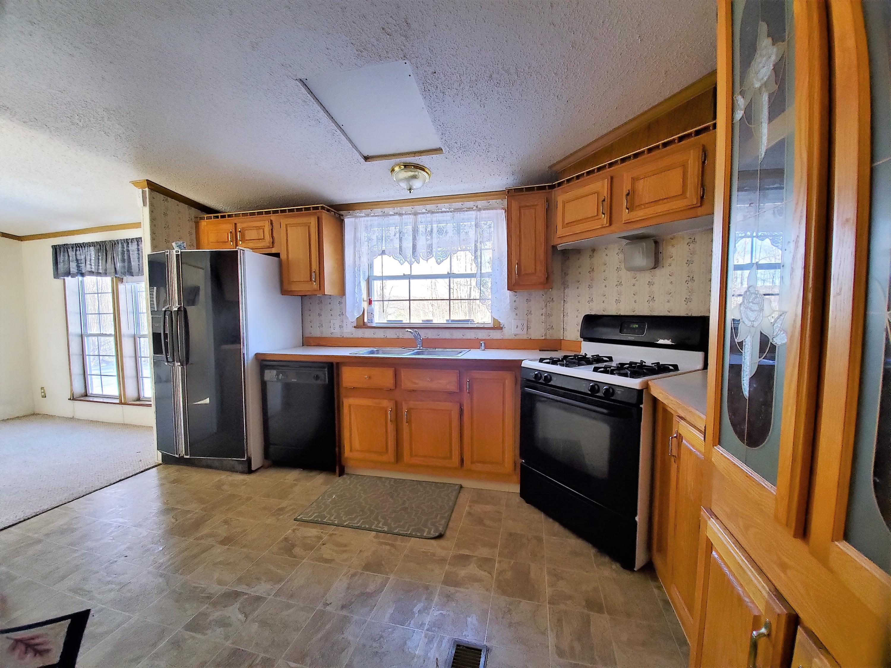 10360 Huffman Lake Road Vanderbilt, MI 49795 - Photo 4 of 24 Gallery Image 4