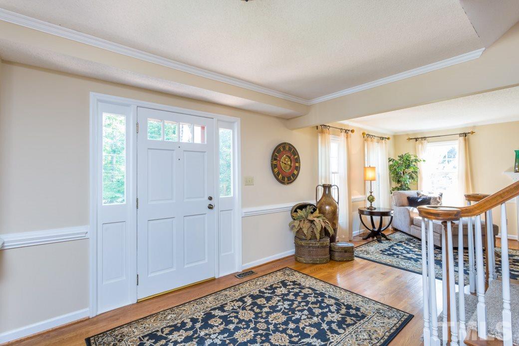 6409 Arnold Road Raleigh, NC 27607 - Photo 3 of 25 a living room with furniture and a window