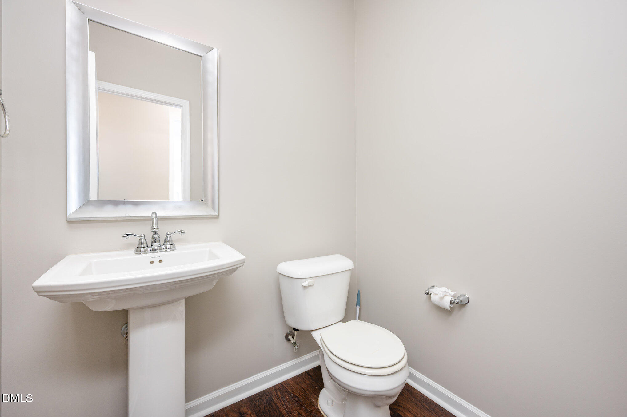 18 Dover Ridge Court Chapel Hill, NC 27517 - Photo 21 of 40 a bathroom with a sink mirror and toilet