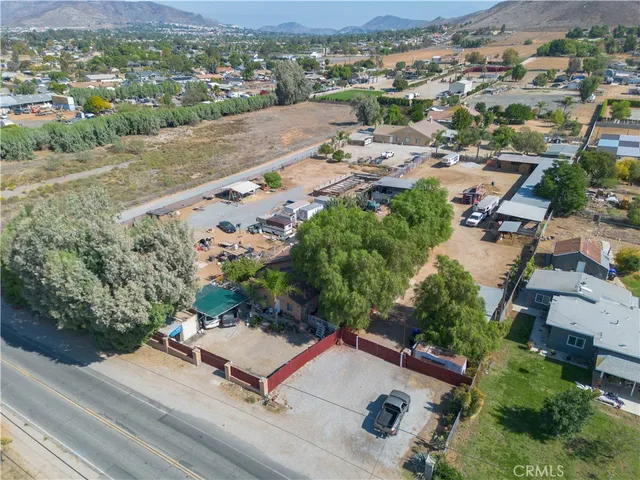 an aerial view of a house with a garden
