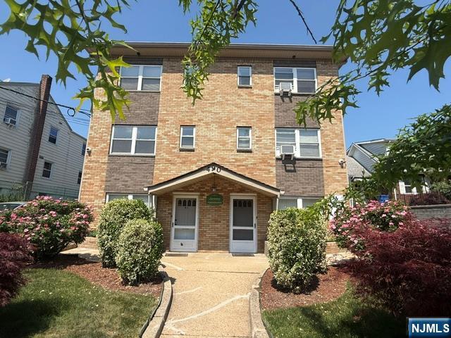 490 Union Avenue Rutherford, NJ 07070 - Photo 1 of 11 front view of a house with a yard