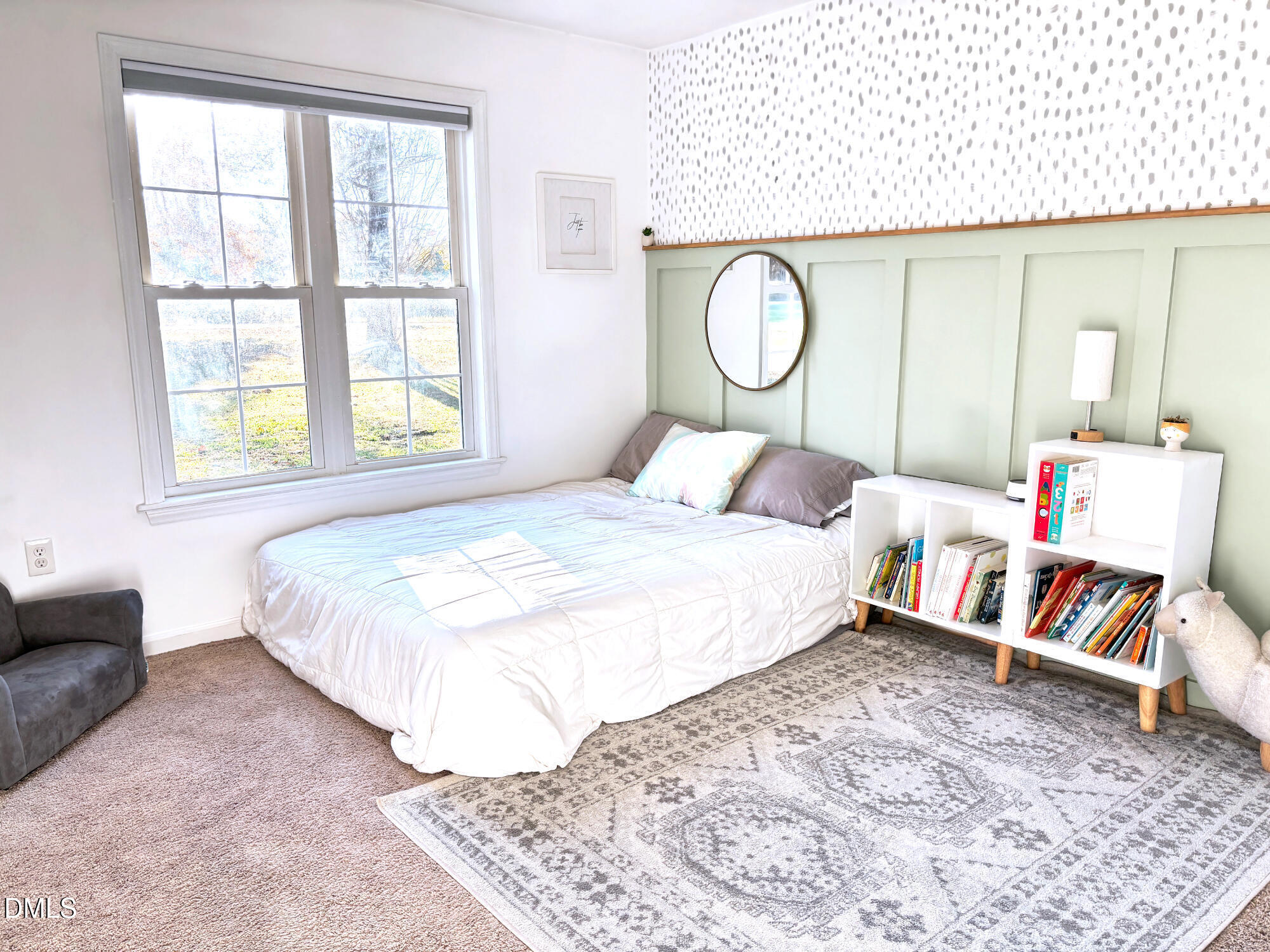 2109 Harris Road Rougemont, NC 27572 - Photo 18 of 35 a bedroom with a bed and a chandelier