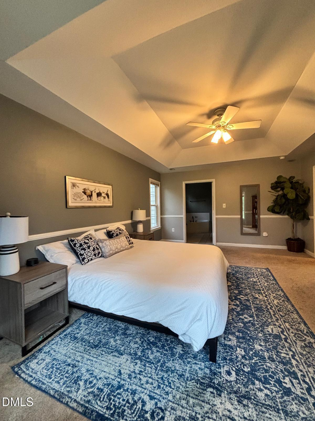 2109 Harris Road Rougemont, NC 27572 - Photo 22 of 35 a bed room with a bed and a television