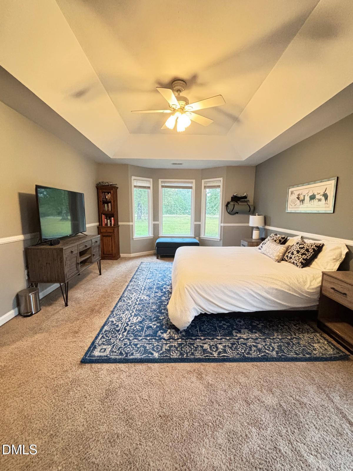 2109 Harris Road Rougemont, NC 27572 - Photo 23 of 35 a living room with couch and a flat screen tv