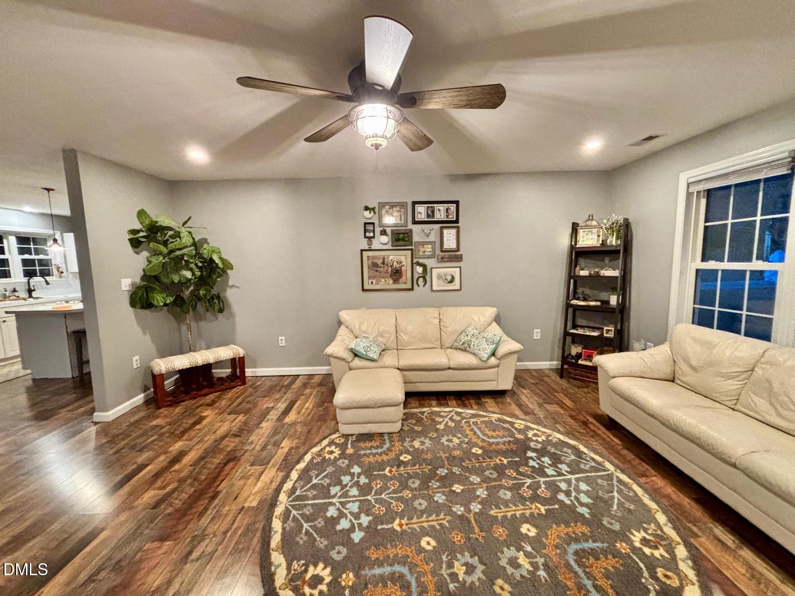 2109 Harris Road Rougemont, NC 27572 - Photo 4 of 35 a living room with furniture and wooden floor