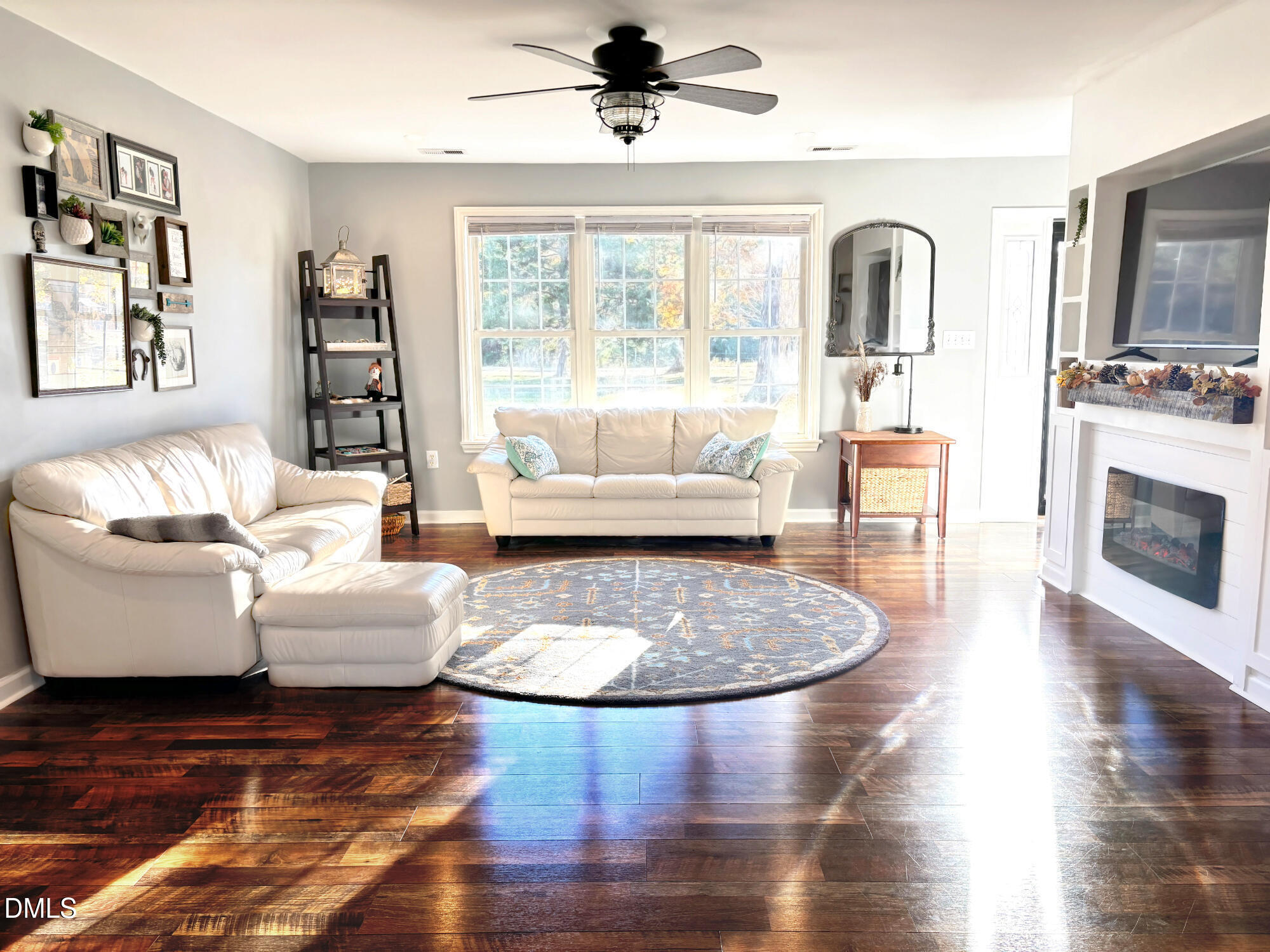 2109 Harris Road Rougemont, NC 27572 - Photo 6 of 35 a living room with furniture and a fireplace