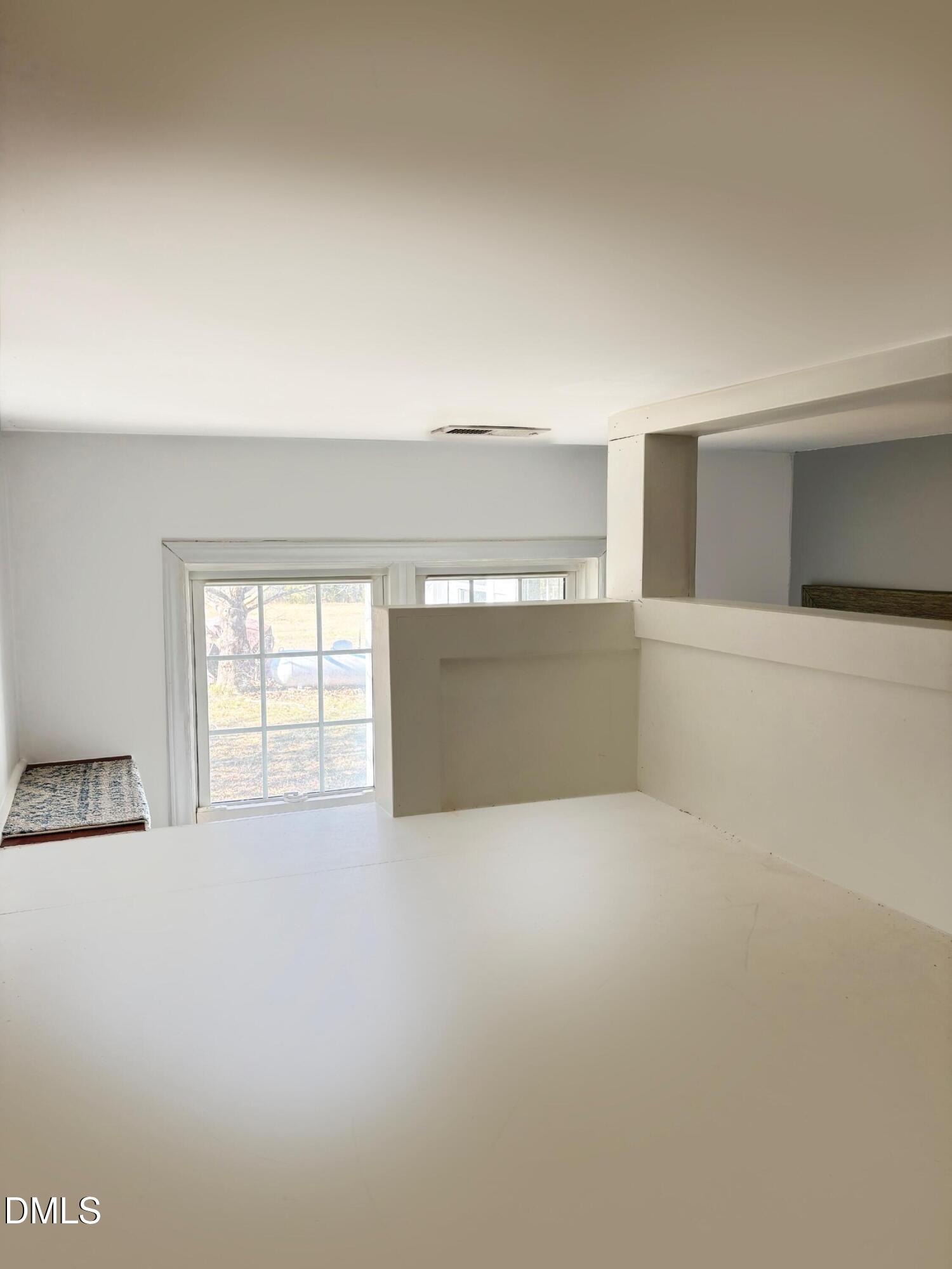 2109 Harris Road Rougemont, NC 27572 - Photo 9 of 35 a view of an empty room with a window