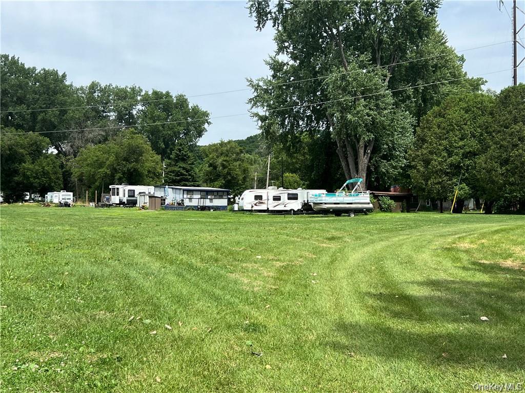 1 Kelts Grove Road Waterford, NY 12188 - Photo 12 of 27 a green field with lots of trees