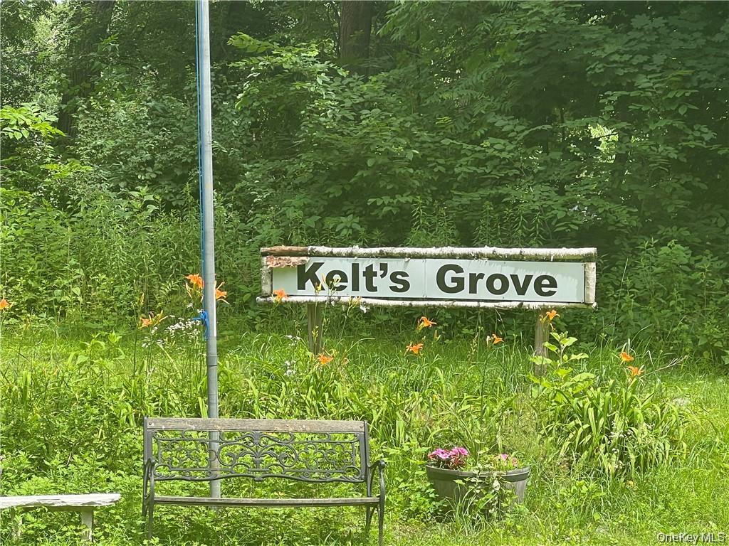 1 Kelts Grove Road Waterford, NY 12188 - Photo 2 of 27 a view of sign board with tall trees