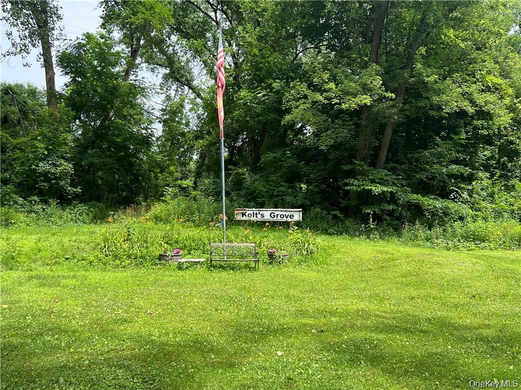 1 Kelts Grove Road Waterford, NY 12188 - Photo 24 of 27 a view of green field with trees in the background