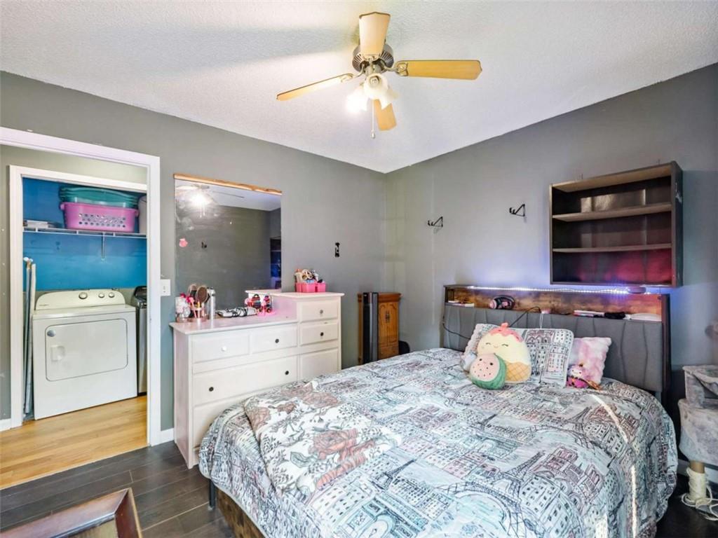 310 Georgian Terrace Alto, GA 30510 - Photo 14 of 39 a bedroom with a bed and a dresser in it