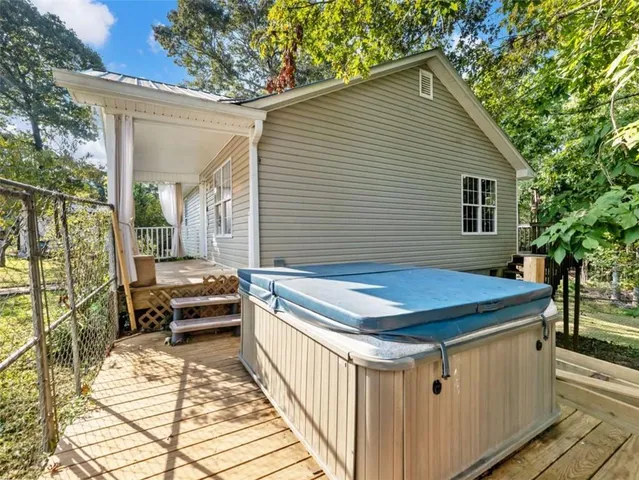 a backyard of a house with seating space