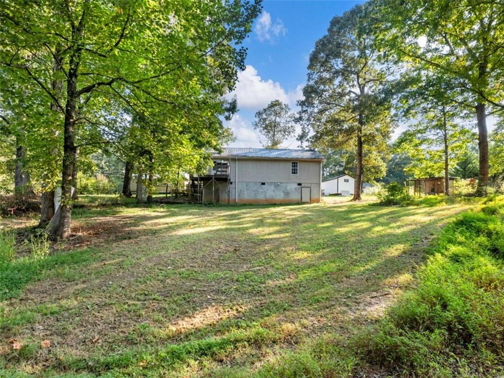 310 Georgian Terrace Alto, GA 30510 - Photo 34 of 39 a view of a house with a yard