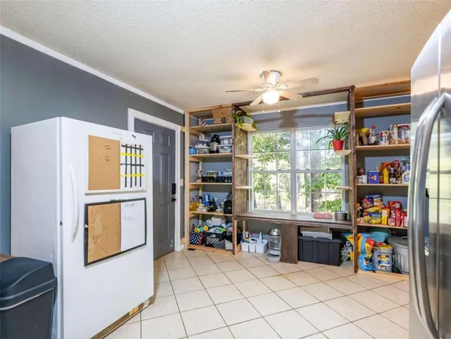 a room with furniture and a window