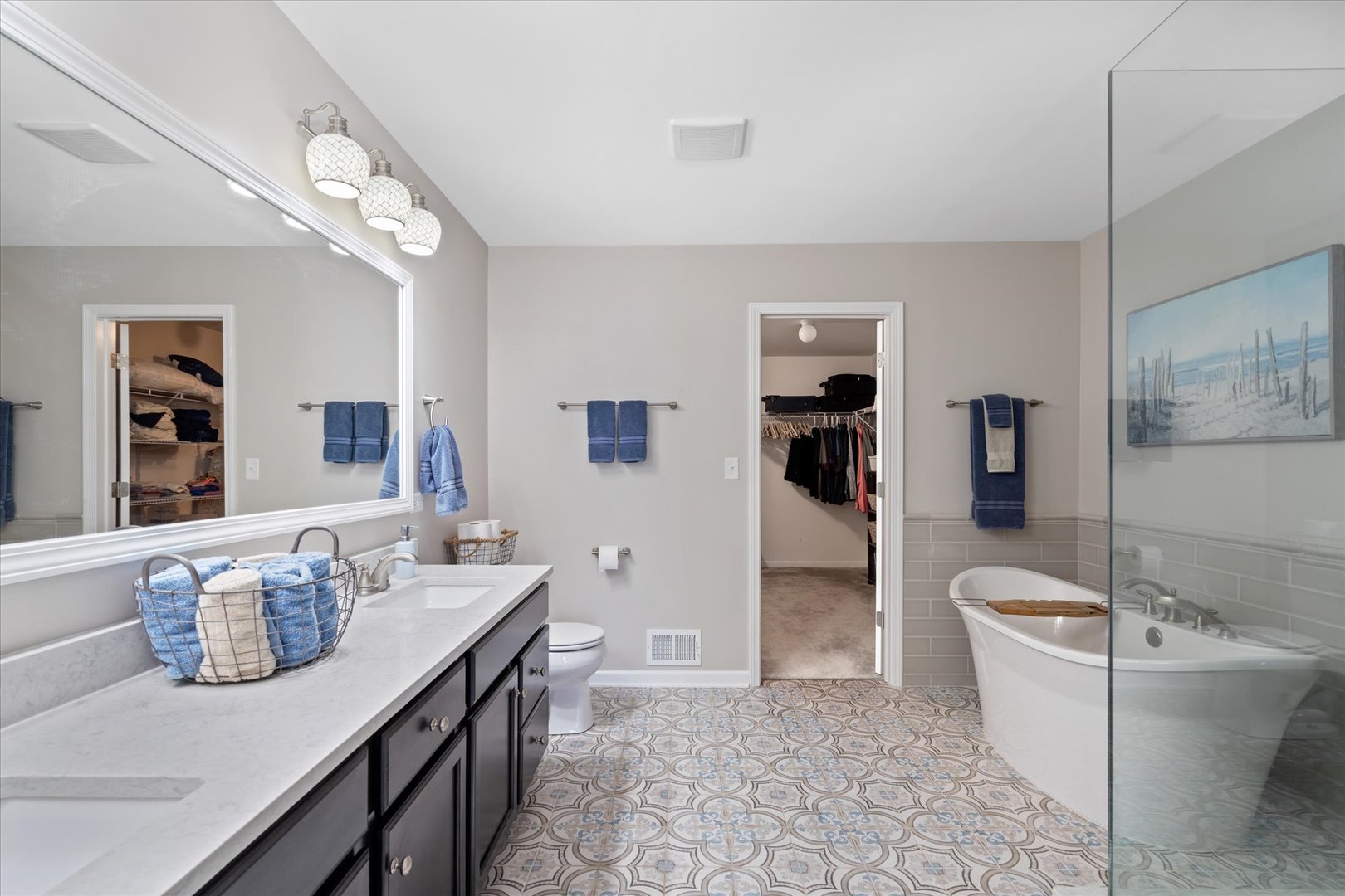 435 Fawn Lane Oswego, IL 60543 - Photo 14 of 26 a spacious bathroom with a granite countertop sink a toilet and shower