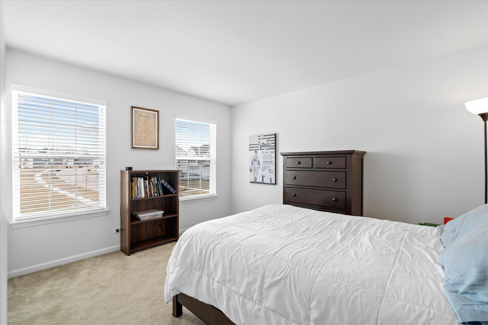 435 Fawn Lane Oswego, IL 60543 - Photo 17 of 26 a bedroom with a bed and a window