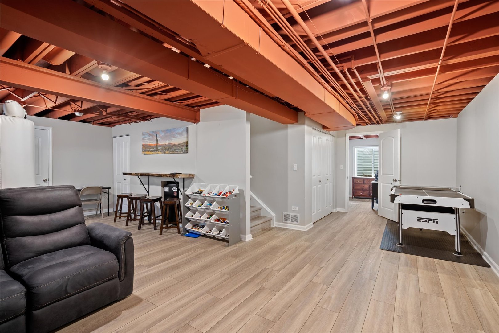 435 Fawn Lane Oswego, IL 60543 - Photo 22 of 26 a living room with furniture and wooden floors