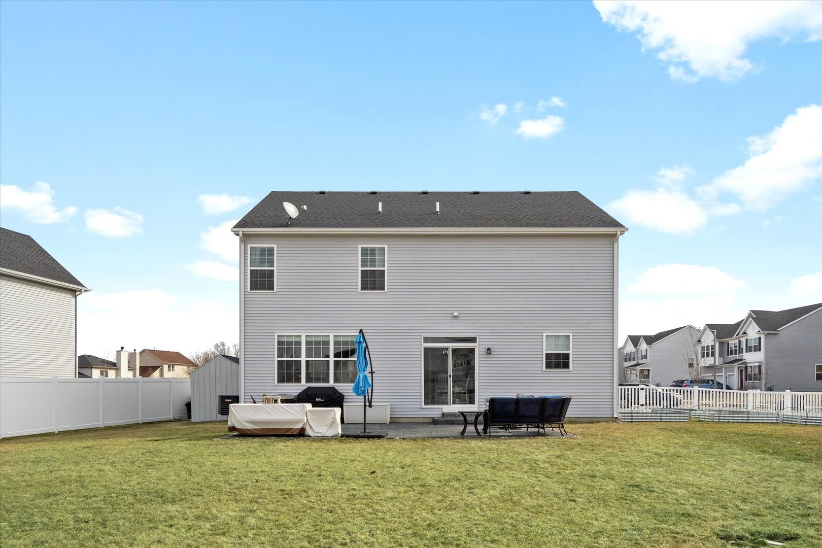 435 Fawn Lane Oswego, IL 60543 - Photo 25 of 26 a front view of a house with garden