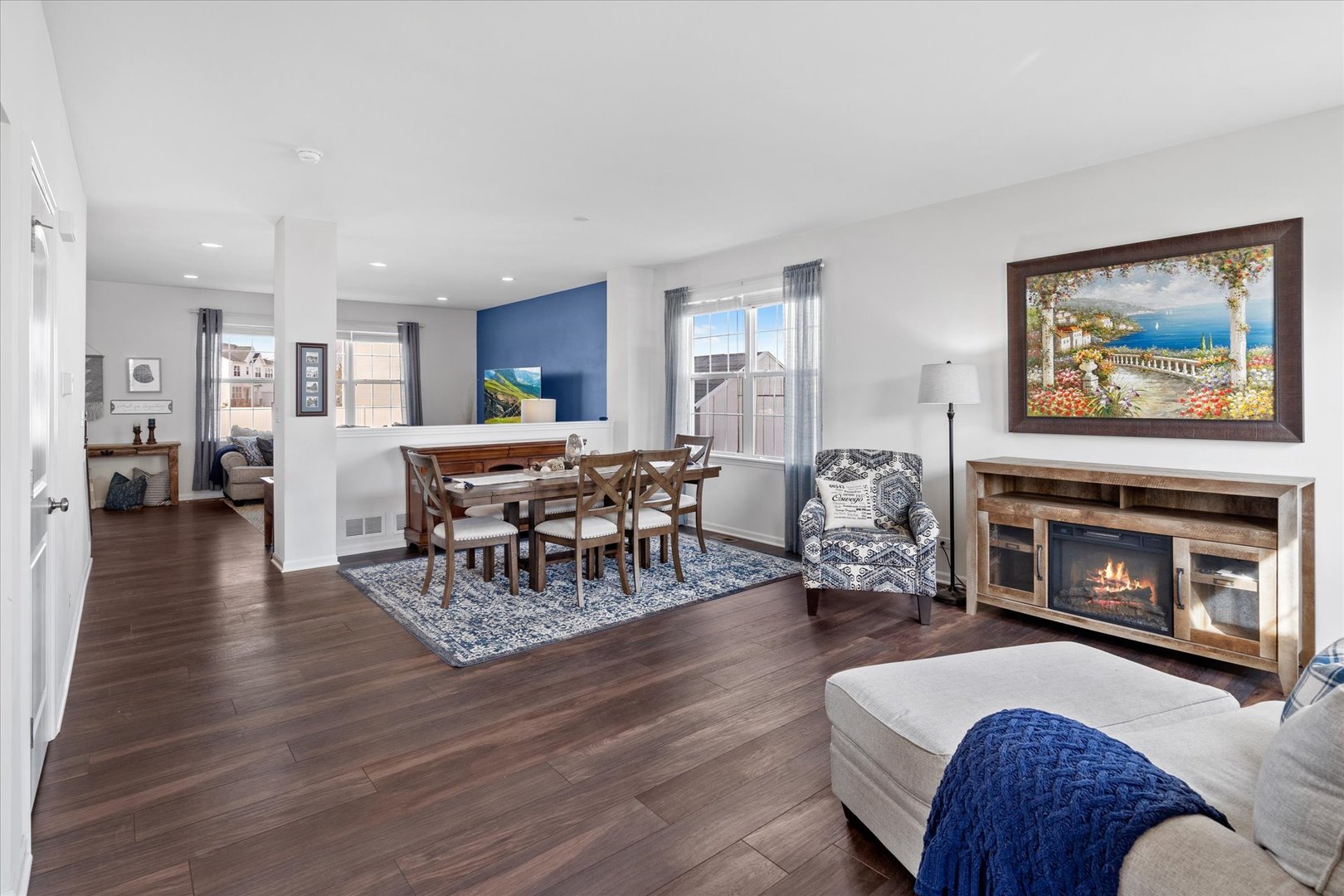 435 Fawn Lane Oswego, IL 60543 - Photo 3 of 26 a living room with furniture and a fireplace