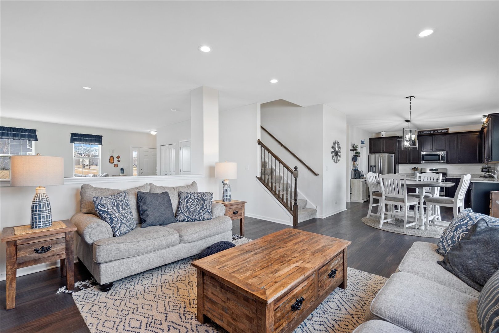 435 Fawn Lane Oswego, IL 60543 - Photo 8 of 26 a living room with furniture and wooden floor