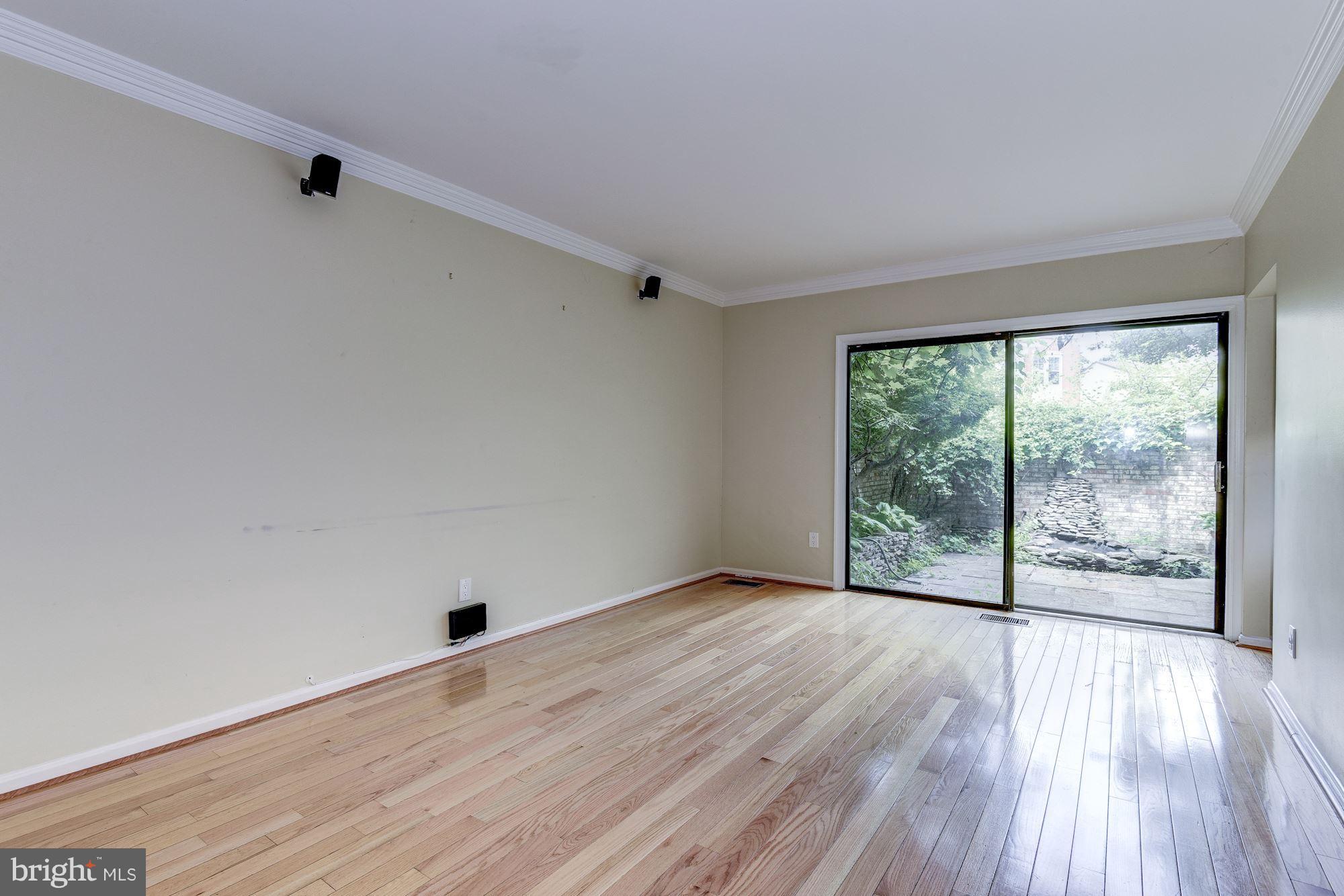 2045 North Glebe Road Arlington, VA 22207 - Photo 7 of 19 wooden floor in an empty room with a window