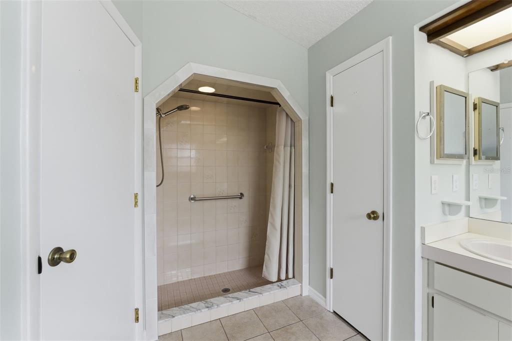 4966 Keysville Avenue Spring Hill, FL 34608 - Photo 29 of 48 a bathroom with a shower and a sink