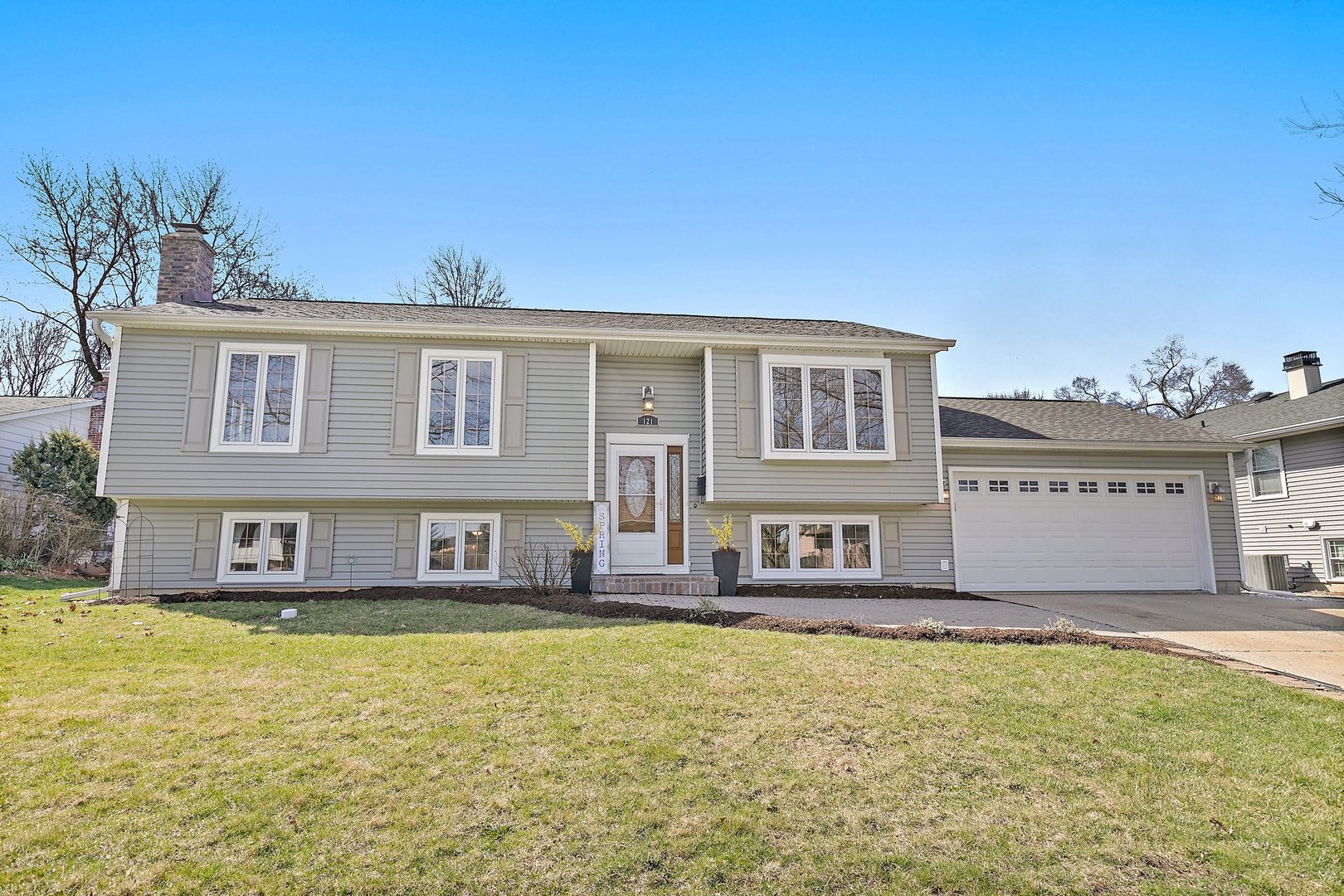121 Ann Street Cary, IL 60013 - Photo 1 of 30 a front view of a house with a yard
