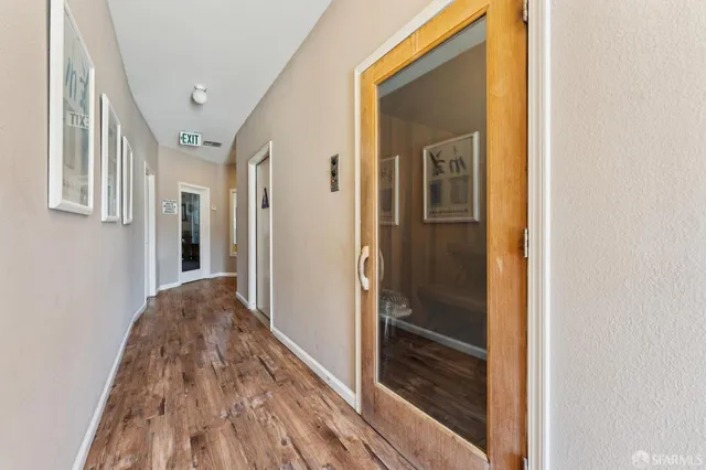 a view of a wooden bench in a porch