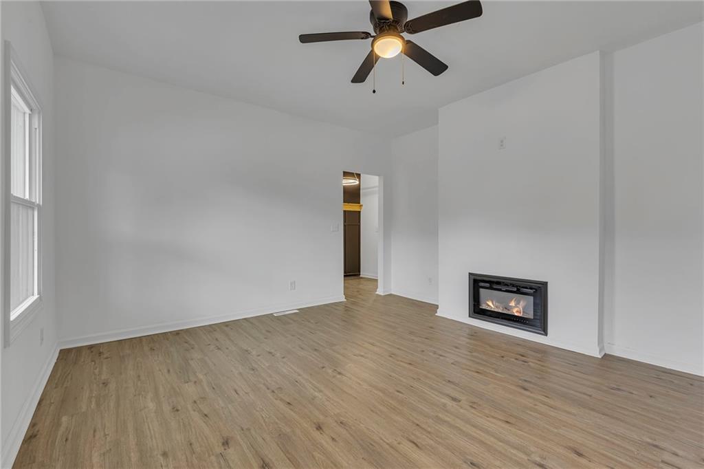 193 Virginia Avenue Rochester, PA 15074 - Photo 7 of 37 a view of a room with wooden floor and a window