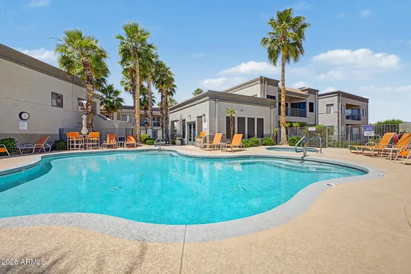 a view of a house with a swimming pool