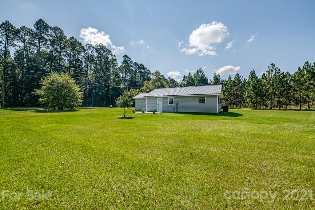 1322 Miller-Flat Road, Unit 1 Jefferson, SC 29718 - Photo 31 of 32 a view of a house with a big yard