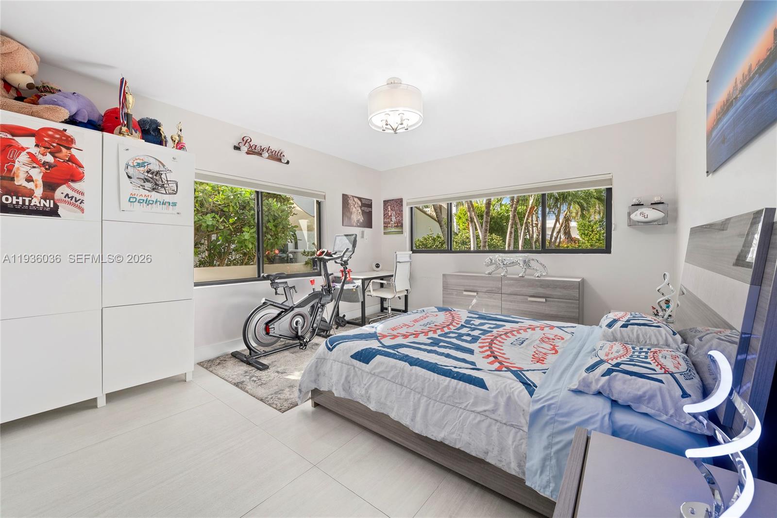 3141 North Bay Road Miami Beach, FL 33140 - Photo 31 of 50 a bedroom with a bed and a dresser