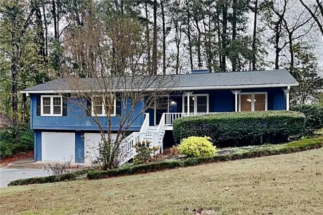 front view of a house with a yard