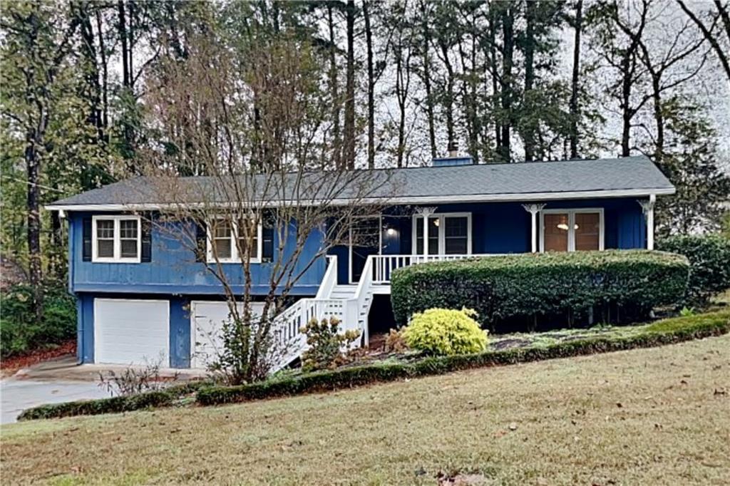 110 Partridge Ridge Woodstock, GA 30188 - Photo 1 of 1 front view of a house with a yard