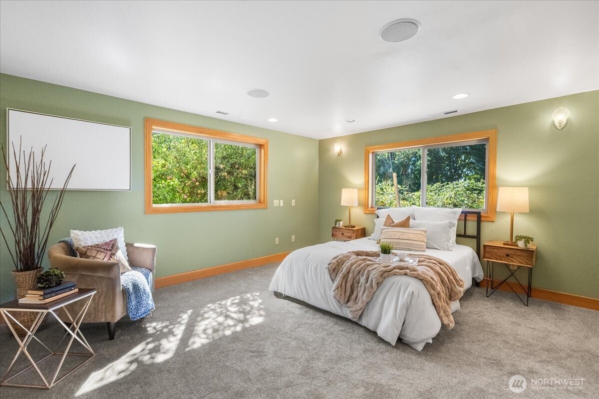 8707 45th Street West Tacoma, WA 98466 - Photo 21 of 39 a bedroom with a bed and window