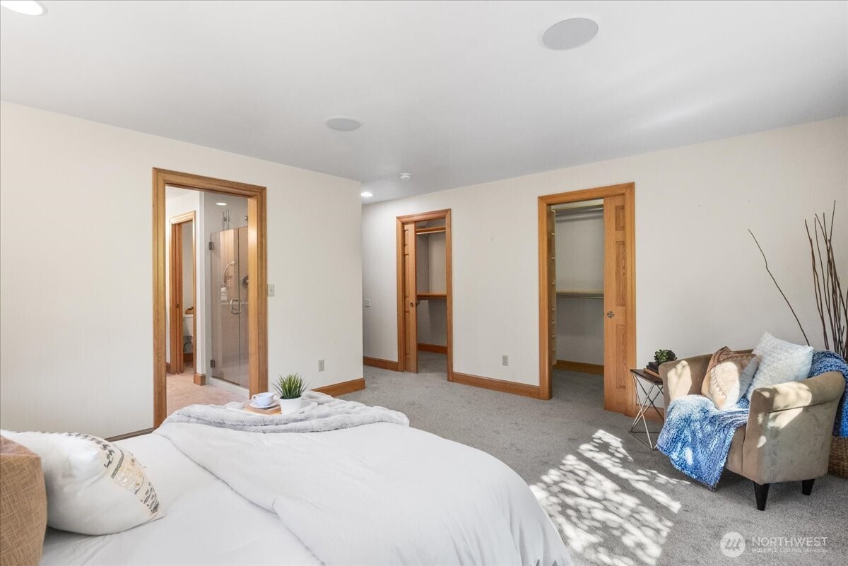 8707 45th Street West Tacoma, WA 98466 - Photo 23 of 39 a bedroom with bed and bathroom