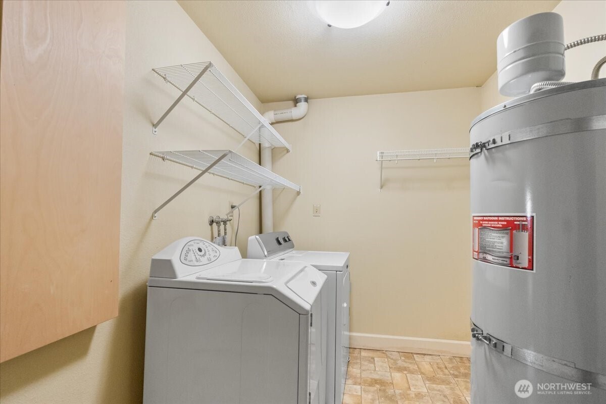 8707 45th Street West Tacoma, WA 98466 - Photo 33 of 39 a utility room with dryer and washer