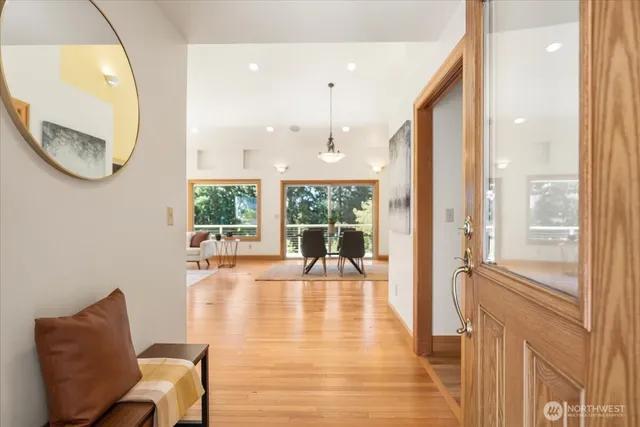 a view of a living room and a large window