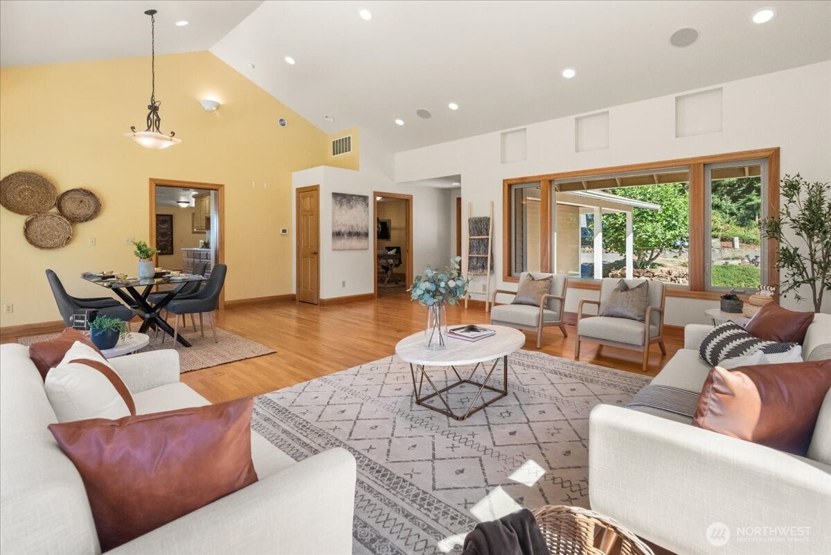 8707 45th Street West Tacoma, WA 98466 - Photo 7 of 39 a living room with furniture and a large window
